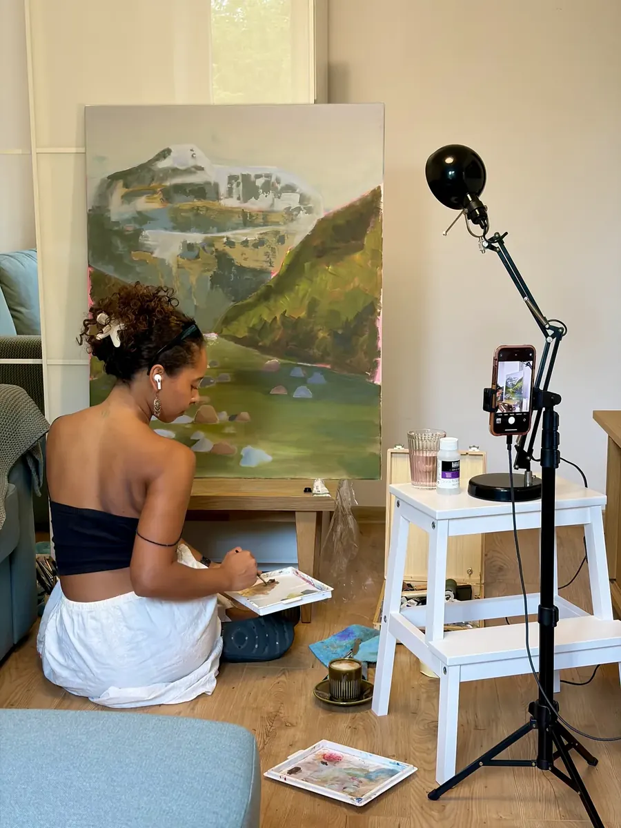 Ana Parente painting in the studio